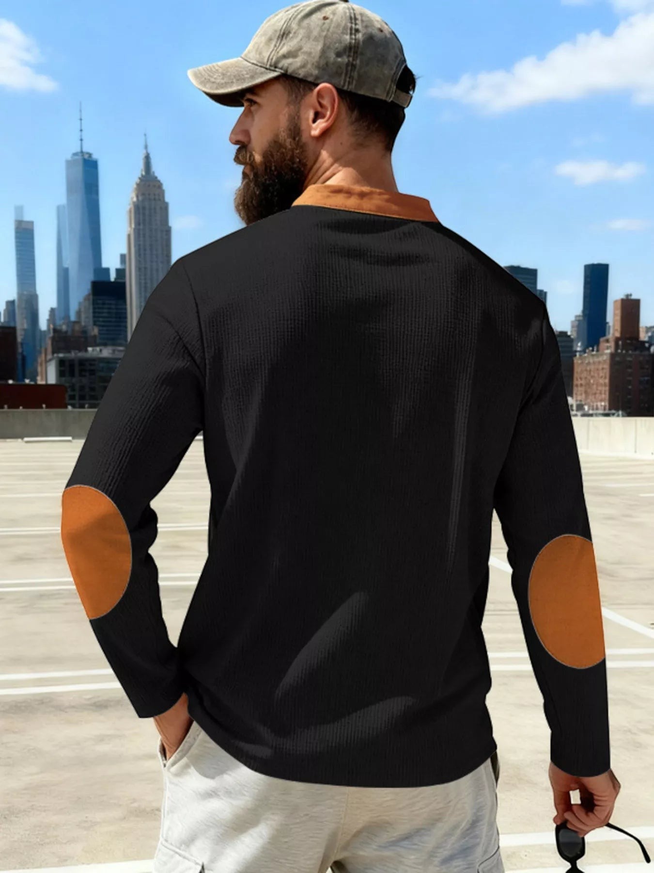 Stylio men's black long sleeve t-shirt with brown elbow patches and lace-up neckline, made of cotton blend.