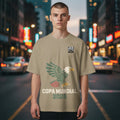 Stylio tan t-shirt with eagle graphic and "Copa Mundial 2026" text. Features US, Canada, and Mexico flags.
