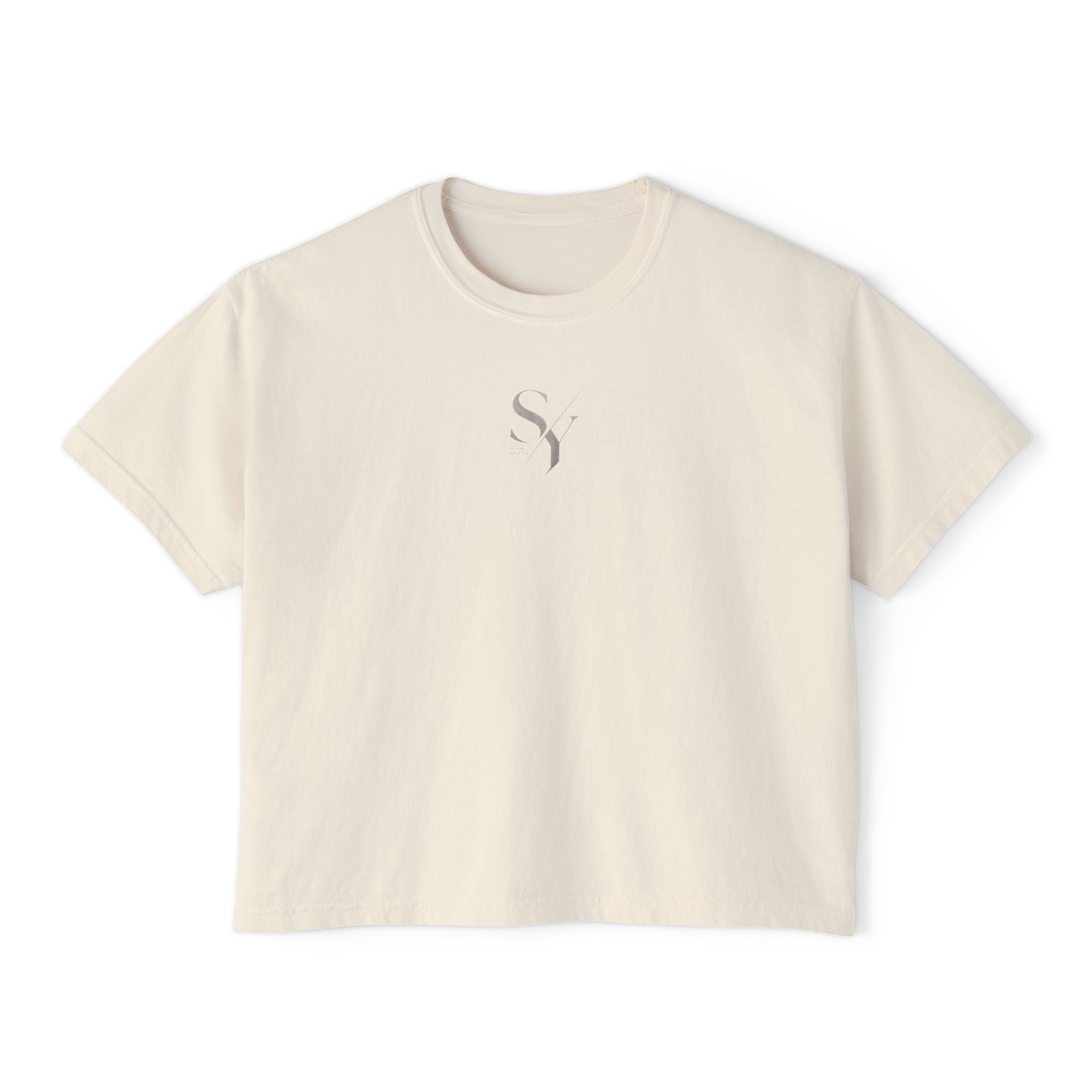 Stylio cream pigment-dyed cotton boxy tee with a subtle grey logo on the chest. Relaxed fit, cropped silhouette.