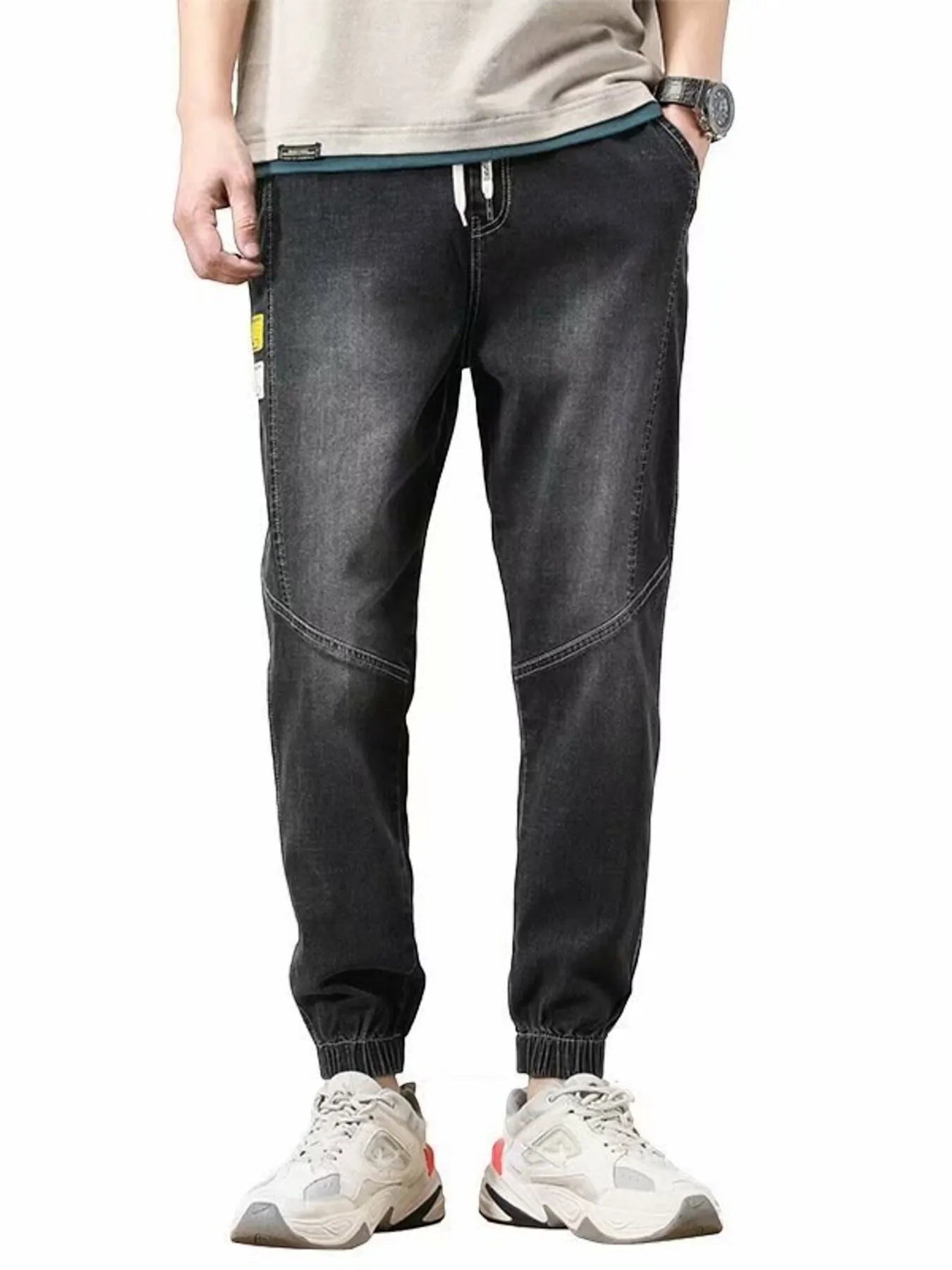 Stylio men's dark wash denim jeans with drawstring waist and elastic cuffs. Relaxed fit, 100% cotton.