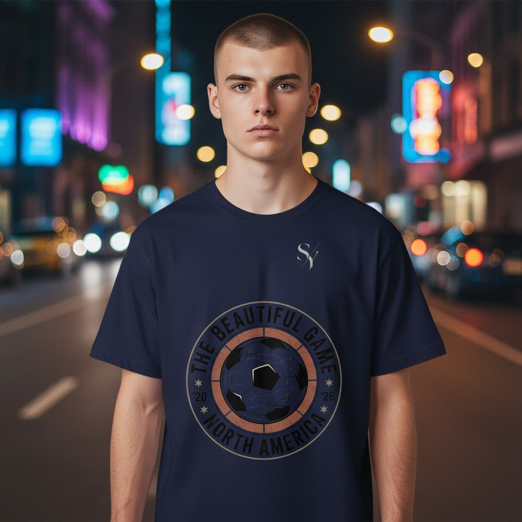 Stylio navy blue short-sleeve polyester t-shirt with a graphic of a soccer ball and text "The Beautiful Game North America" on the front.