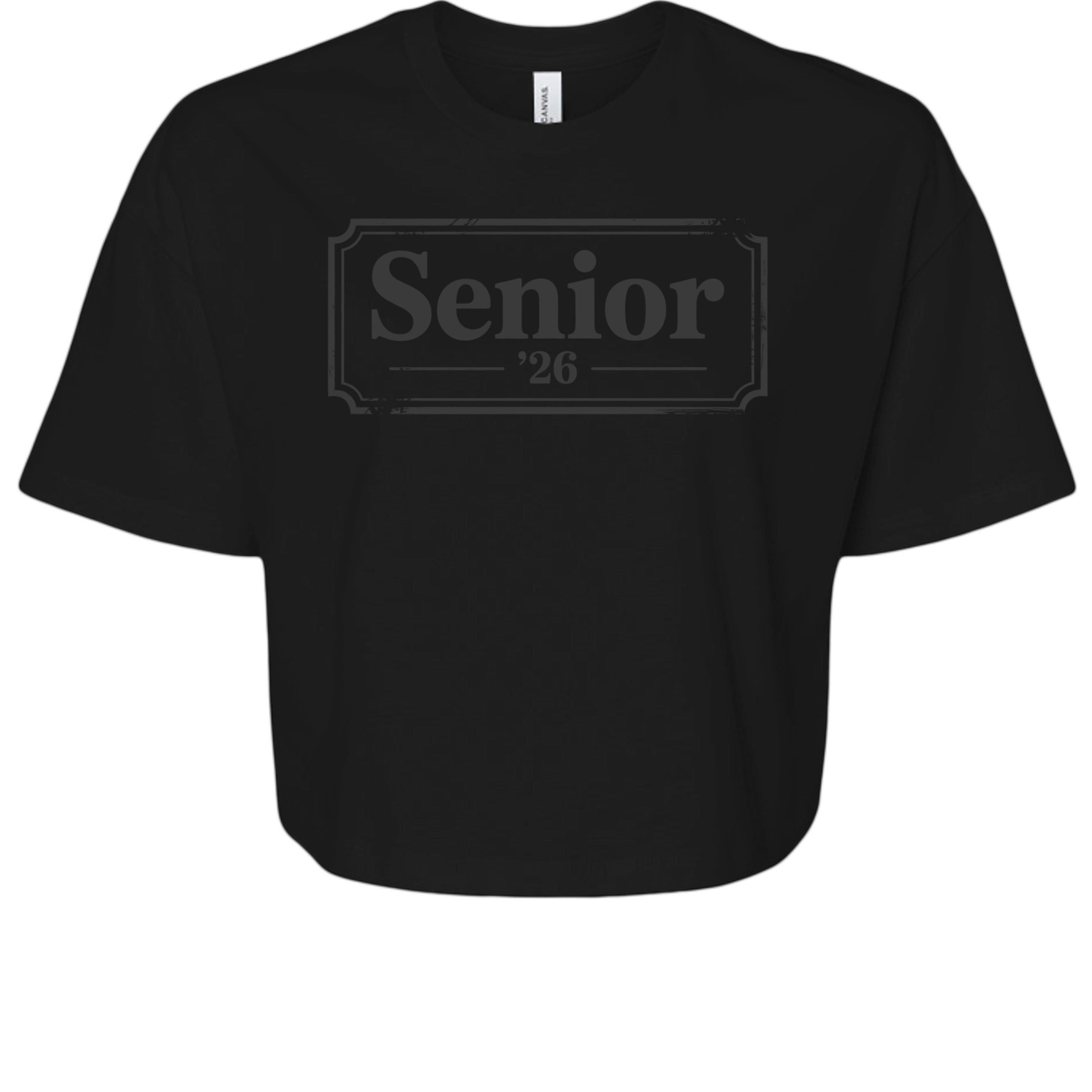 Stylio black 100% cotton crop tee with "Senior '26" graphic. Relaxed fit, oversized sleeves, mid-length hem.