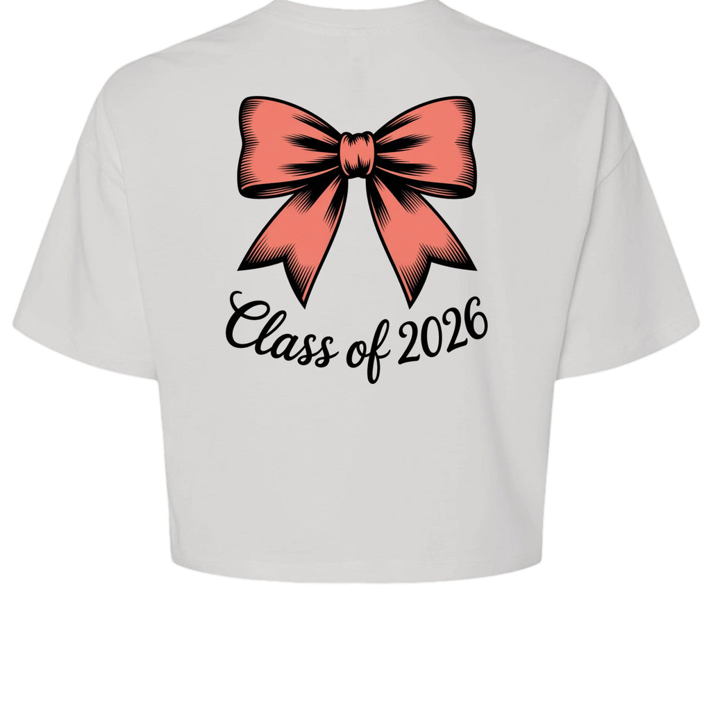 Stylio white cotton crop tee with a coral bow graphic and "Class of 2026" text.
