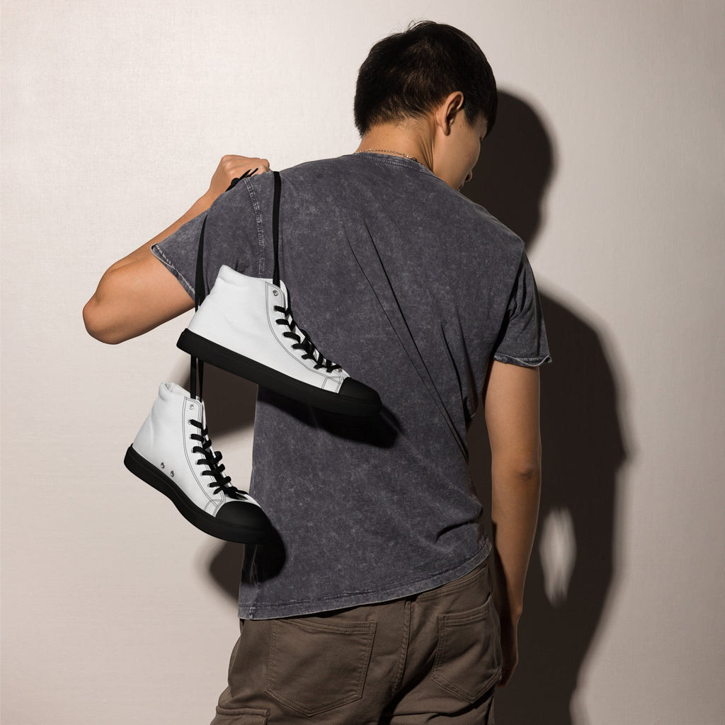 Stylio men's white canvas high top sneakers with black laces and soles, worn by a man.