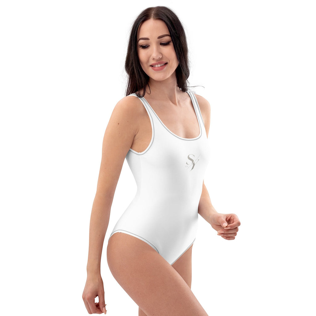 Stylio white one-piece swimsuit with scoop neckline and low scoop back, featuring subtle grey trim and a small logo.