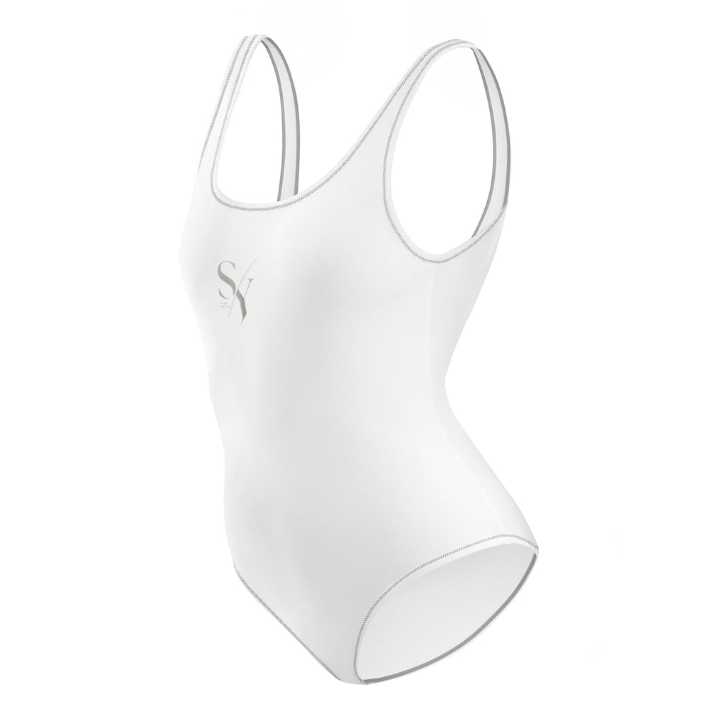 Stylio white one-piece swimsuit with scoop neckline, low scoop back, and zig-zag stitching detail. Made from recycled polyester and elastane.