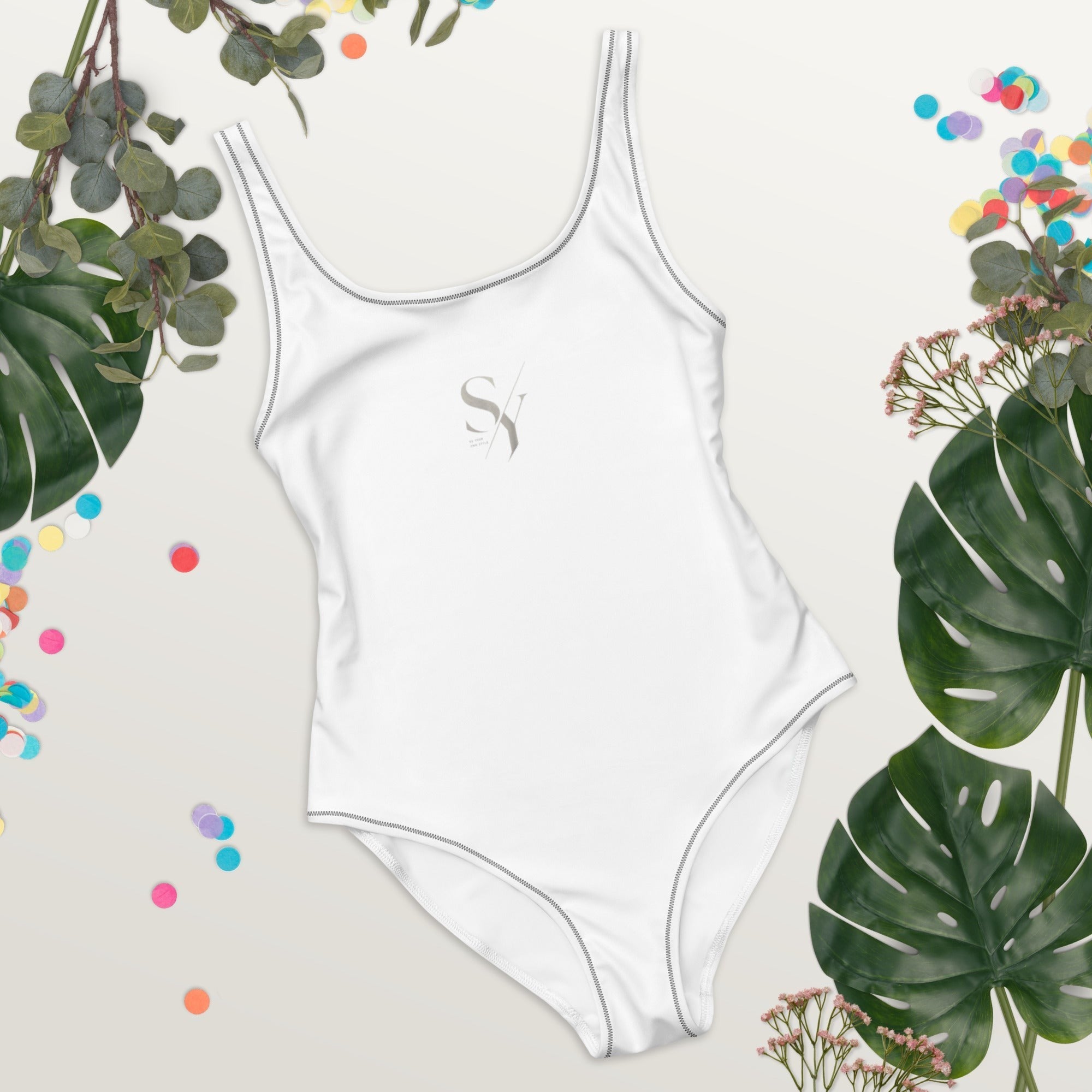 Stylio white one-piece swimsuit with scoop neckline and low scoop back, made from recycled polyester and elastane.