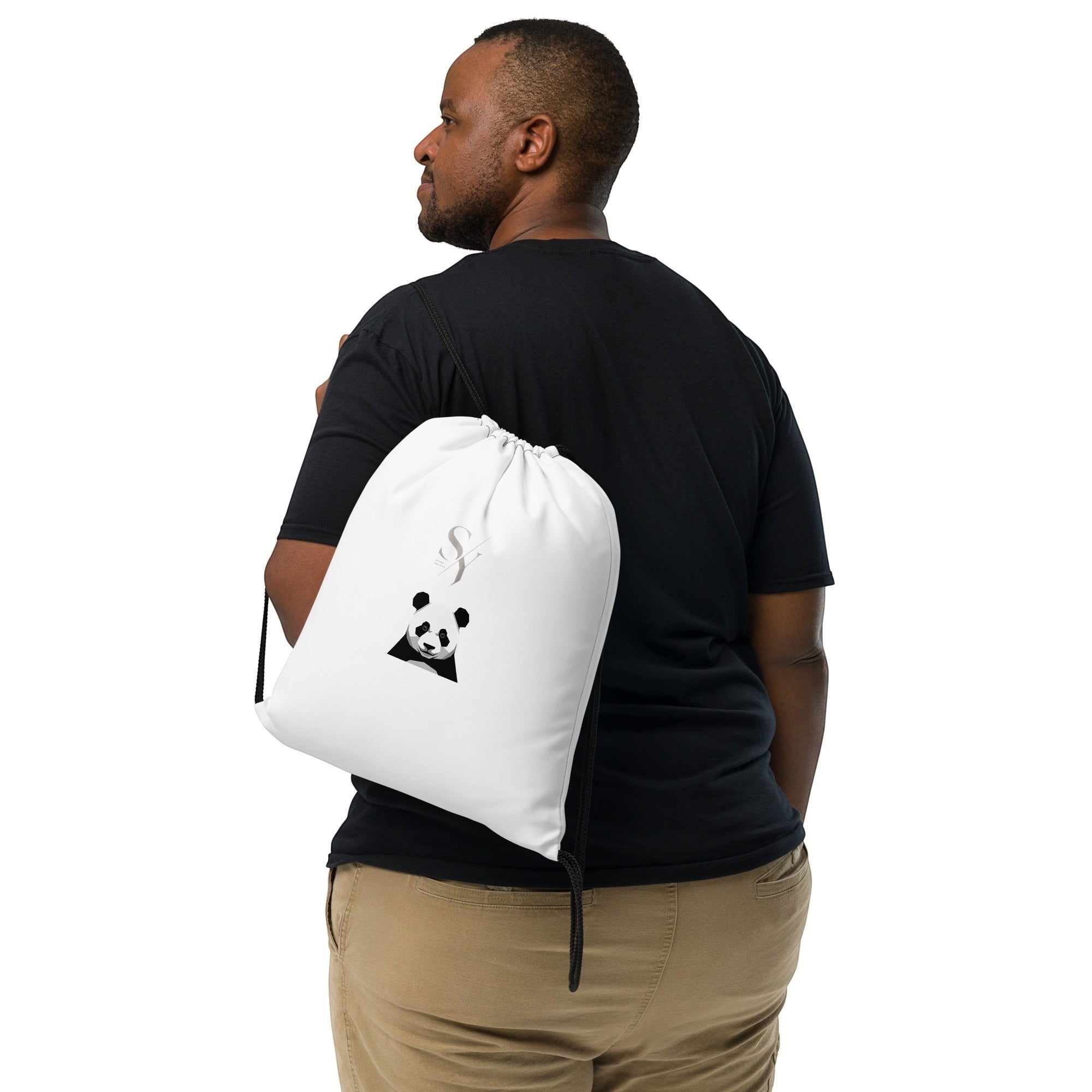 Stylio white polyester drawstring bag with a black panda face graphic and a stylized 'S' logo, worn by a man.